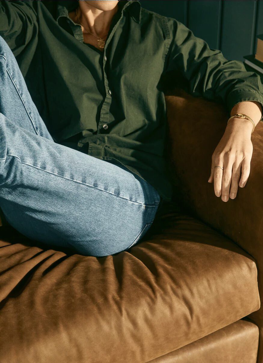 Woman sitting on comfortable cushion